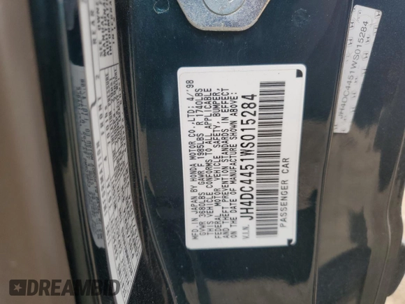 1998 Acura Integra LS with VIN JH4DC4451WS015284, listed as a Copart auction lot 60865275 with 162,712 mi miles and Salvage title. Bid and sale history available at DreamBid. Image 12.