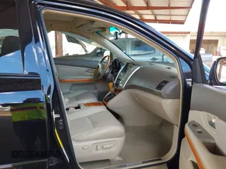 2008 Lexus RX with VIN 2T2HK31UX8C072143, listed as a IAAI auction lot 41788431 with 163,364 mi miles. Bid and sale history available at carsss.com. Image 5.