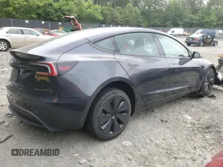2025 Tesla Model 3 Long Range with VIN 5YJ3E1EAXSF878982, listed as a Copart auction lot 60302315 with 4,312 mi miles and Salvage title. Bid and sale history available at DreamBid. Image 3.