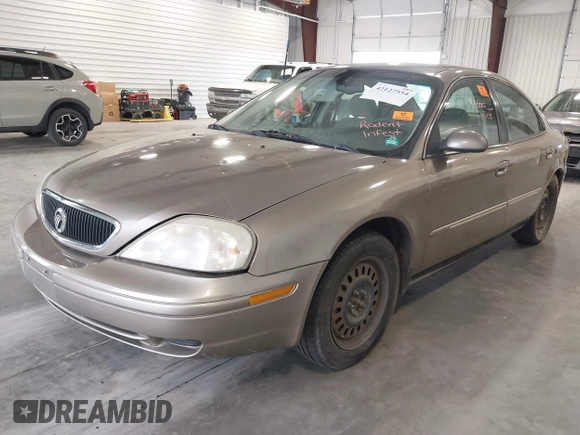 2002 Mercury Sable GS z VIN 1MEFM50U62G621153, wystawiony jako IAAI lot #42127554 z przebiegiem 159 053 mil mil oraz . Historia ofert i sprzedaży dostępna na DreamBid. Obrazek 2.
