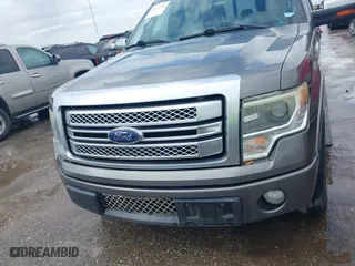 2013 Ford F-150 XL with VIN 1FTFW1CT2DFC41825, listed as a IAAI auction lot 41722792 with 218,353 mi miles. Bid and sale history available at carsss.com. Image 12.