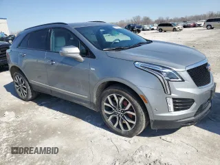 2023 Cadillac XT5 AWD Sport with VIN 1GYKNGRS7PZ133622, listed as a Copart auction lot 48342095 with 63,008 mi miles and Salvage title. Bid and sale history available at DreamBid. Image 4.