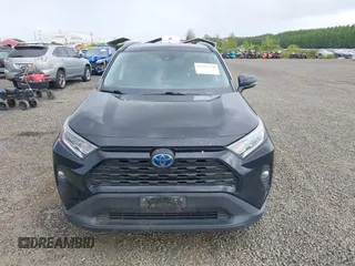 2020 Toyota RAV4 Hybrid XLE z VIN 2T3RWRFV3LW064403, wystawiony jako IAAI lot #42297370 z przebiegiem 102 730 mil mil oraz . Historia ofert i sprzedaży dostępna na DreamBid. Obrazek 12.