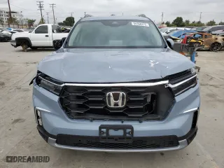 2025 Honda Pilot Touring with VIN 5FNYG2H73SB016693, listed as a Copart auction lot 54366275 with 1,259 mi miles and Salvage Title. Bid and sale history available at carsss.com. Image 5.