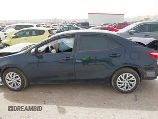 2018 Toyota Corolla L z VIN 5YFBURHE6JP840504, wystawiony jako IAAI lot #41790115 z przebiegiem 83 026 mil mil oraz . Historia ofert i sprzedaży dostępna na DreamBid. Obrazek 13.