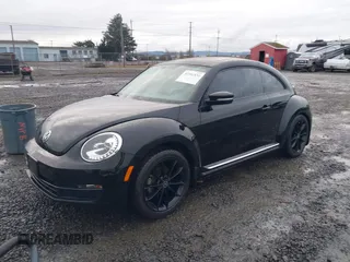 2014 Volkswagen Beetle 2.5L w/Sun with VIN 3VWJP7AT3EM608906, listed as a IAAI auction lot 41501830 with 42,804 mi miles and . Bid and sale history available at DreamBid. Image 17.