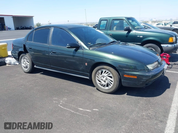 1999 Saturn SL с VIN 1G8ZK5274XZ304652, выставлен на аукционе IAAI как лот 42618620 с пробегом 98 131 миль миль и . История ставок и продаж доступна на DreamBid. Изображение 1.