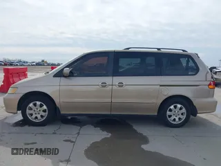 2002 Honda Odyssey EX-L z VIN 2HKRL18042H567858, wystawiony jako IAAI lot #41686147 z przebiegiem 264 570 mil mil oraz . Historia ofert i sprzedaży dostępna na DreamBid. Obrazek 14.