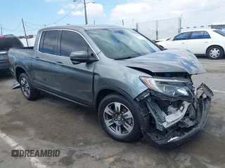 2017 Honda Ridgeline RTL-T with VIN 5FPYK2F63HB001488, listed as a IAAI auction lot 40078694 with Not provided miles and . Bid and sale history available at DreamBid. Image 1.
