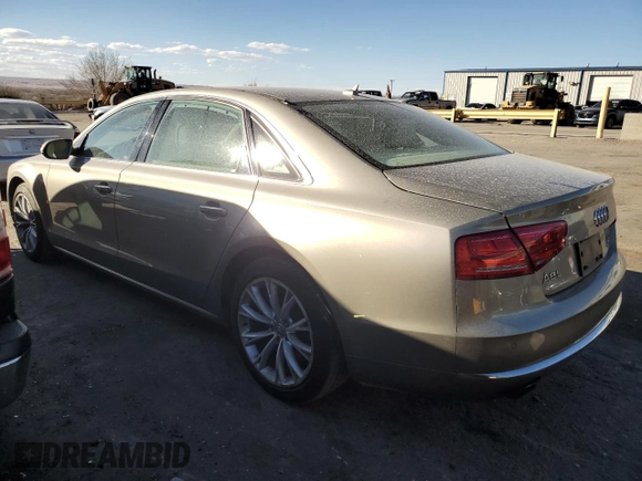 2012 Audi A8 with VIN WAURVAFDXCN001749, listed as a Copart auction lot 44379515 with 169,860 mi miles and Salvage Title. Bid and sale history available at DreamBid. Image 2.