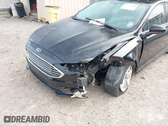 2018 Ford Fusion SE z VIN 3FA6P0H79JR276224, wystawiony jako IAAI lot #41277958 z przebiegiem 99 098 mil mil oraz . Historia ofert i sprzedaży dostępna na DreamBid. Obrazek 6.