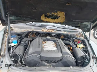 2004 Volkswagen Touareg with VIN WVGCM77L14D045663, listed as a IAAI auction lot 42170895 with 96,709 mi miles and . Bid and sale history available at DreamBid. Image 10.