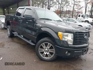 2014 Ford F-150 XL with VIN 1FTFW1EF2EFB57612, listed as a IAAI auction lot 41509583 with 194,036 mi miles. Bid and sale history available at carsss.com. Image 1.