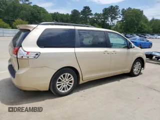 2012 Toyota Sienna XLE AAS with VIN 5TDYK3DC1CS277339, listed as a Copart auction lot 57494715 with 240,666 mi miles and Salvage title. Bid and sale history available at DreamBid. Image 3.