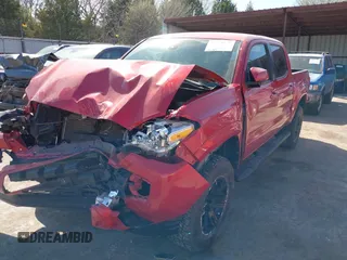 2022 Toyota Tacoma SR with VIN 3TYAX5GNXNT042988, listed as a IAAI auction lot 41879152 with 30,383 mi miles and . Bid and sale history available at DreamBid. Image 2.