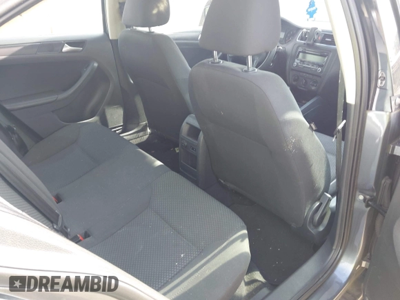 2013 Volkswagen Jetta S z VIN 3VW1K7AJ5DM242345, wystawiony jako IAAI lot #42598698 z przebiegiem 169 870 mil mil oraz . Historia ofert i sprzedaży dostępna na DreamBid. Obrazek 8.