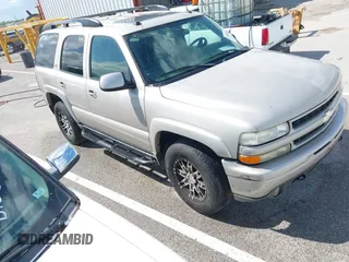 2005 Chevrolet Tahoe LT z VIN 1GNEK13T35R196103, wystawiony jako IAAI lot #42053184 z przebiegiem 326 536 mil mil oraz . Historia ofert i sprzedaży dostępna na DreamBid. Obrazek 1.