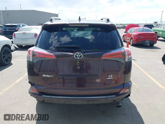 2017 Toyota RAV4 LE with VIN 2T3BFREV4HW580568, listed as a IAAI auction lot 42100704 with 157,300 mi miles and . Bid and sale history available at DreamBid. Image 16.