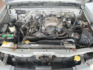 2003 Nissan Frontier XE z VIN 1N6ED26Y73C423628, wystawiony jako Copart lot #59129945 z przebiegiem 102 644 mil mil oraz Czysty tytuł • Clean title. Historia ofert i sprzedaży dostępna na DreamBid. Obrazek 11.