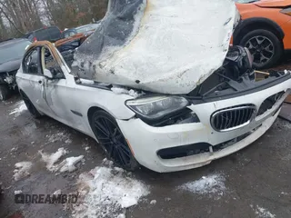 2013 BMW 7 Series 750Li with VIN WBAYE8C56DD133951, listed as a IAAI auction lot 41307533 with Not provided miles and . Bid and sale history available at DreamBid. Image 1.
