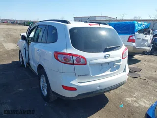 2012 Hyundai Santa Fe GLS with VIN 5XYZG3AB7CG145829, listed as a IAAI auction lot 41768390 with 143,972 mi miles. Bid and sale history available at carsss.com. Image 3.
