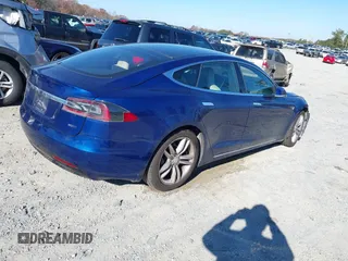 2016 Tesla Model S 90D with VIN 5YJSA1E25GF144614, listed as a IAAI auction lot 40941311 with 83,587 mi miles and . Bid and sale history available at DreamBid. Image 4.