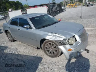 2006 Chrysler 300 C with VIN 2C3LA63H76H129828, listed as a IAAI auction lot 41602089 with 185,721 mi miles. Bid and sale history available at carsss.com. Image 1.