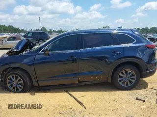 2022 Mazda CX-9 Touring z VIN JM3TCBCY7N0600370, wystawiony jako IAAI lot #42658049 z przebiegiem 113 000 mil mil oraz . Historia ofert i sprzedaży dostępna na DreamBid. Obrazek 15.