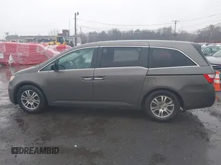 2012 Honda Odyssey EX-L with VIN 5FNRL5H64CB037689, listed as a IAAI auction lot 41857822 with 121,601 mi miles and . Bid and sale history available at carsss.com. Image 14.