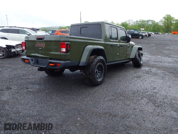2023 Jeep Gladiator Mojave with VIN 1C6JJTEG6PL564504, listed as a IAAI auction lot 41752685 with 20,430 mi miles and . Bid and sale history available at DreamBid. Image 4.