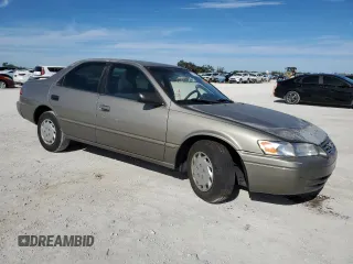 1999 Toyota Camry LE z VIN 4T1BG22K8XU426130, wystawiony jako Copart lot #87368604 z przebiegiem 276 204 mil mil oraz Szkoda całkowita • Salvage title. Historia ofert i sprzedaży dostępna na DreamBid. Obrazek 4.