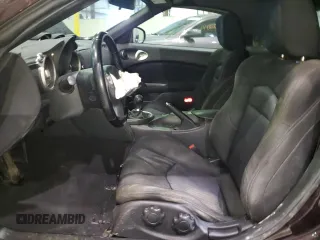 2010 Nissan 370Z Touring с VIN JN1AZ4FH9AM304066, выставлен на аукционе Copart как лот 84176404 с пробегом Не указан миль и На запчасти • Non repairable. История ставок и продаж доступна на DreamBid. Изображение 7.