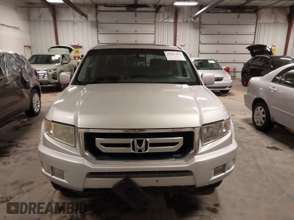 2009 Honda Ridgeline RTL with VIN 2HJYK16519H000129, listed as a IAAI auction lot 41891810 with 186,124 mi miles. Bid and sale history available at carsss.com. Image 12.