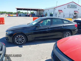 2014 BMW 3 Series GT 328i xDrive with VIN WBA3X5C51ED557347, listed as a IAAI auction lot 42028680 with 178,469 mi miles. Bid and sale history available at carsss.com. Image 13.
