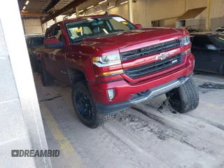 2018 Chevrolet Silverado 1500 LT with VIN 3GCUKREC0JG580317, listed as a IAAI auction lot 41868522 with 75,738 mi miles. Bid and sale history available at carsss.com. Image 1.
