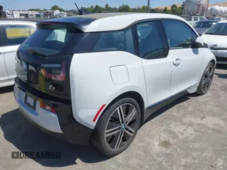 2014 BMW i3 with VIN WBY1Z2C55EV284358, listed as a IAAI auction lot 42597996 with 48,233 mi miles and . Bid and sale history available at DreamBid. Image 4.