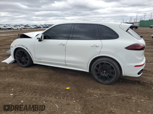2016 Porsche Cayenne GTS with VIN WP1AD2A27GLA76553, listed as a Copart auction lot 53569615 with 69,761 mi miles and Salvage title. Bid and sale history available at DreamBid. Image 2.