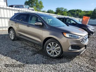 2019 Ford Edge Titanium with VIN 2FMPK4K99KBC31259, listed as a Copart auction lot 63067555 with 86,629 mi miles and Salvage title. Bid and sale history available at DreamBid. Image 4.