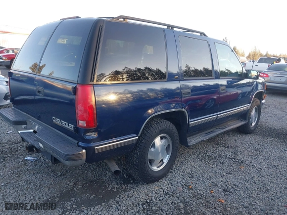 1997 Chevrolet Tahoe with VIN 1GNEK13R4VJ418974, listed as a IAAI auction lot 41560411 with 198,170 mi miles. Bid and sale history available at carsss.com. Image 4.