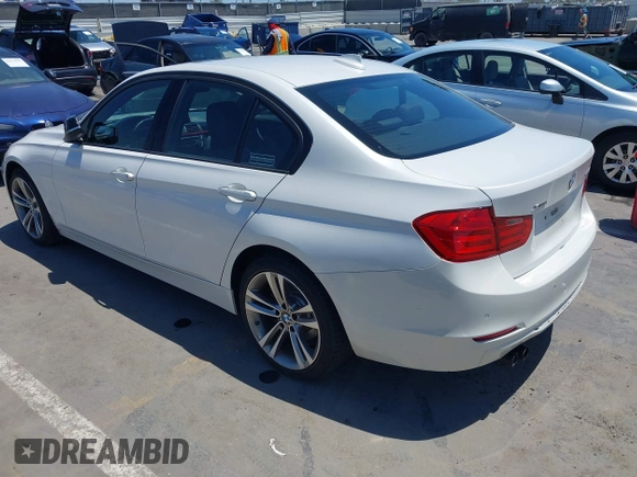 2013 BMW 3 Series 328i xDrive with VIN WBA3B3C56DJ698238, listed as a IAAI auction lot 42333709 with 82,167 mi miles and . Bid and sale history available at DreamBid. Image 3.