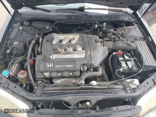 2001 Honda Accord Cpe EX w/Leather with VIN 1HGCG22561A014950, listed as a IAAI auction lot 41312685 with 194,967 mi miles. Bid and sale history available at carsss.com. Image 10.