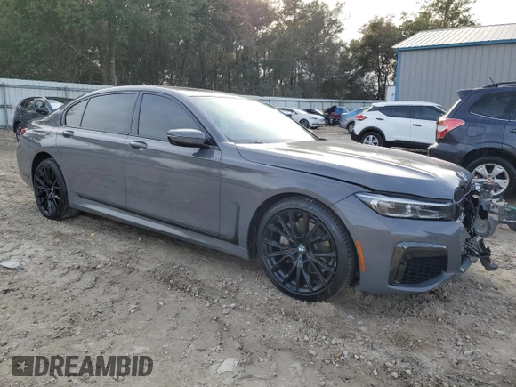 2020 BMW 7 Series 740i with VIN WBA7T2C06LCD15613, listed as a Copart auction lot 42206705 with 76,520 mi miles and Salvage Title. Bid and sale history available at carsss.com. Image 4.