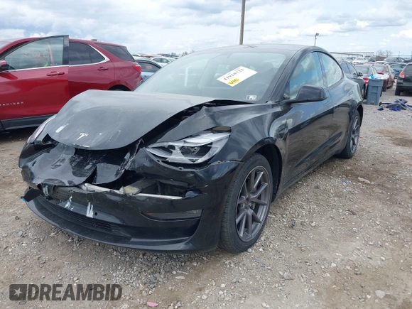 2021 Tesla Model 3 Long Range with VIN 5YJ3E1EB4MF012822, listed as a IAAI auction lot 41918721 with 69,105 mi miles. Bid and sale history available at carsss.com. Image 6.