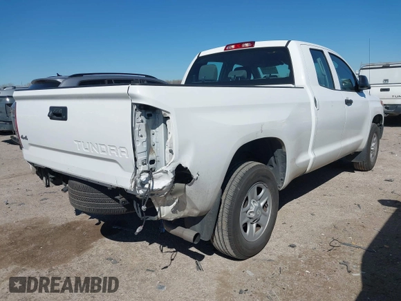 2014 Toyota Tundra 4WD Truck SR with VIN 5TFUM5F17EX055949, listed as a IAAI auction lot 41728783 with 107,019 mi miles. Bid and sale history available at carsss.com. Image 4.
