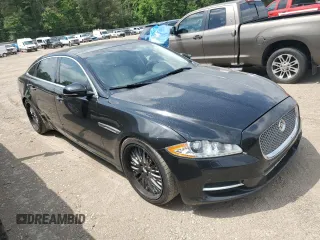 2015 Jaguar XJ with VIN SAJWA2GZXF8V88962, listed as a Copart auction lot 53919035 with 129,987 mi miles and Salvage Title. Bid and sale history available at carsss.com. Image 4.
