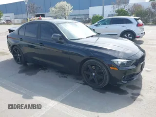 2014 BMW 3 Series 328i with VIN WBA3C1C55EK115218, listed as a IAAI auction lot 41824817 with 101,941 mi miles. Bid and sale history available at carsss.com. Image 1.