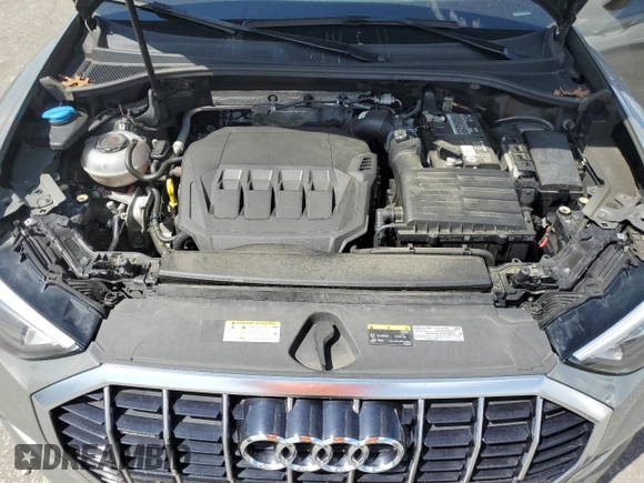 2021 Audi Q3 Premium with VIN WA1AUCF37M1067054, listed as a Copart auction lot 57299815 with 67,334 mi miles and Salvage title. Bid and sale history available at DreamBid. Image 12.