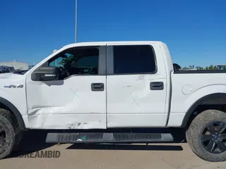 2014 Ford F-150 XL with VIN 1FTFW1EF0EFC74637, listed as a IAAI auction lot 41459594 with 164,970 mi miles. Bid and sale history available at carsss.com. Image 14.