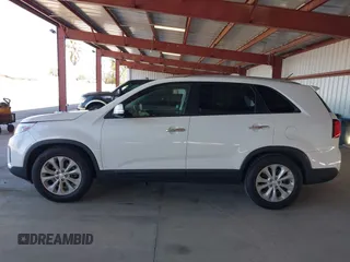 2015 Kia Sorento EX with VIN 5XYKU4A74FG577696, listed as a IAAI auction lot 41870637 with 129,400 mi miles. Bid and sale history available at carsss.com. Image 14.