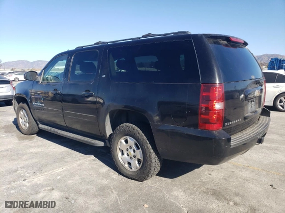2009 Chevrolet Suburban LT w/2LT with VIN 1GNFK26369R272487, listed as a Copart auction lot 88810655 with 317,184 mi miles and Clean Title. Bid and sale history available at carsss.com. Image 2.